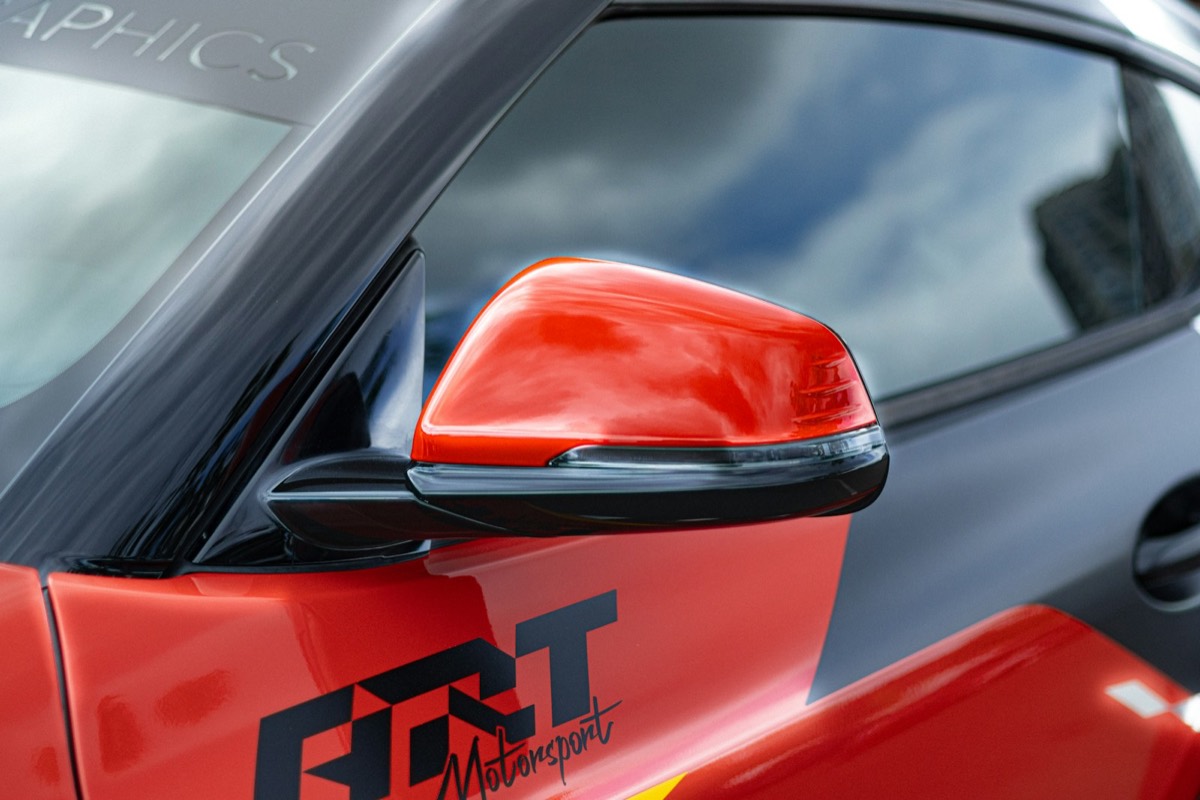 A close-up of a car's side mirror
