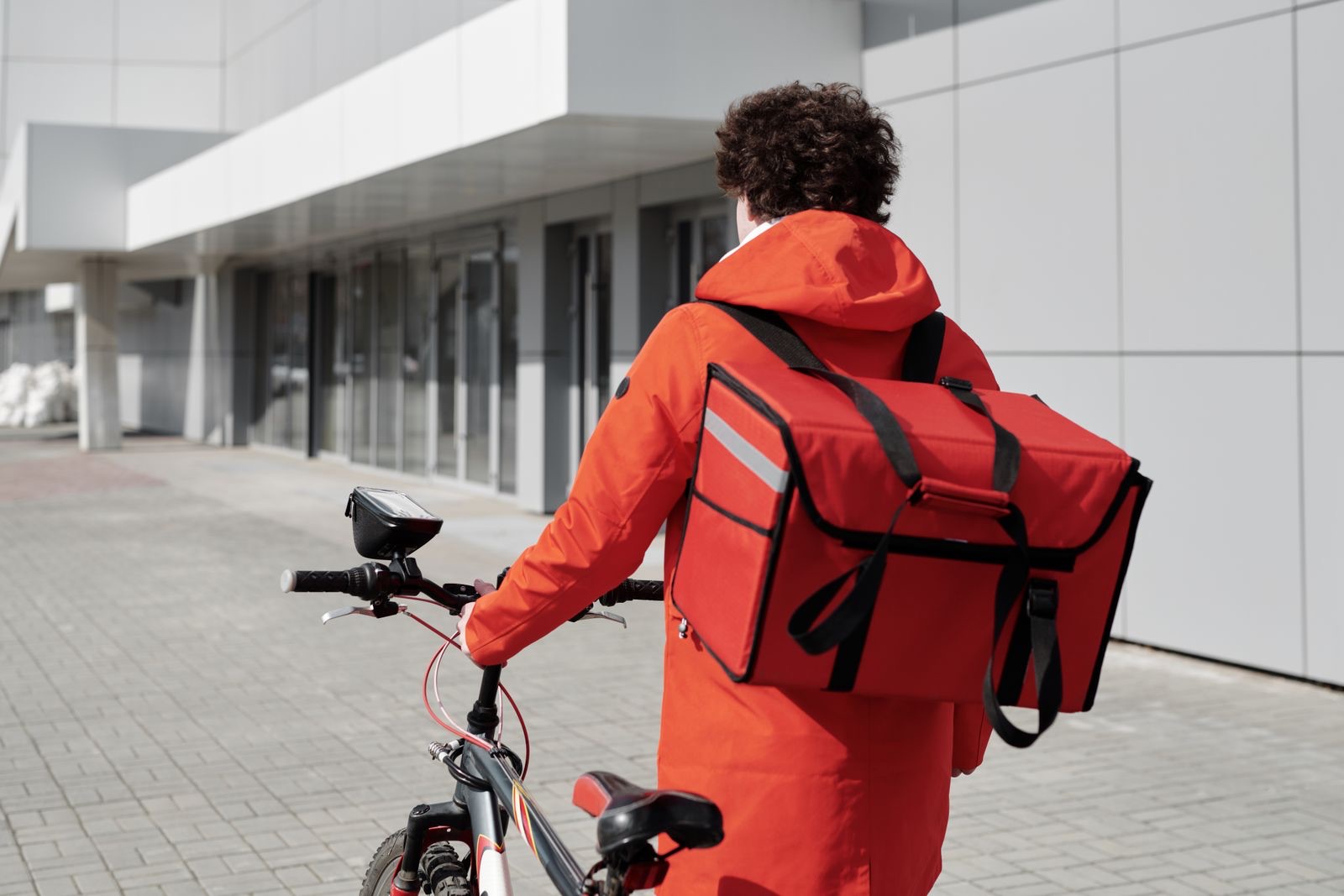 A food delivery rider with a bike