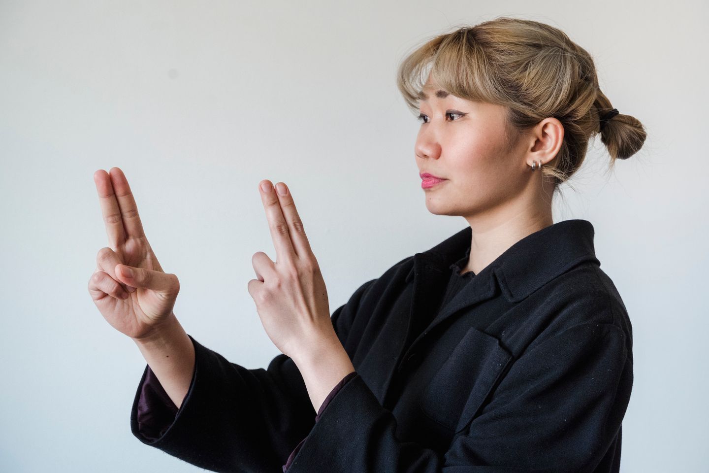 A person signing in sign language