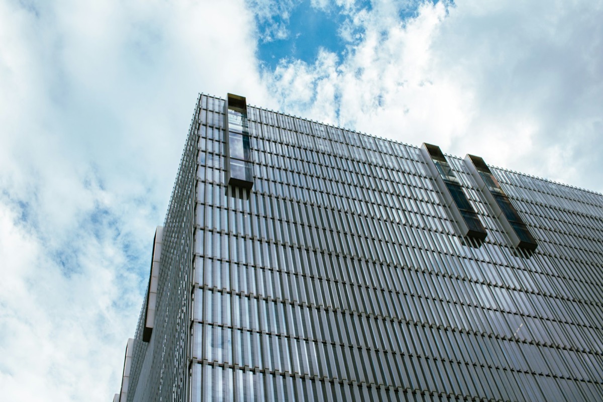 A tall building with a sky background