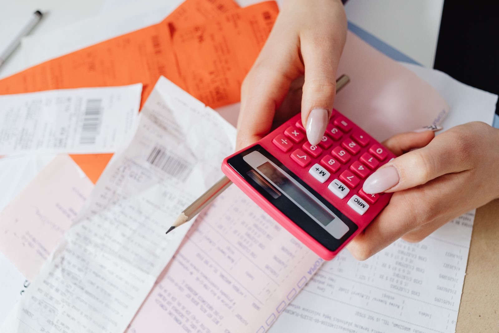 Adding up receipts with a calculator