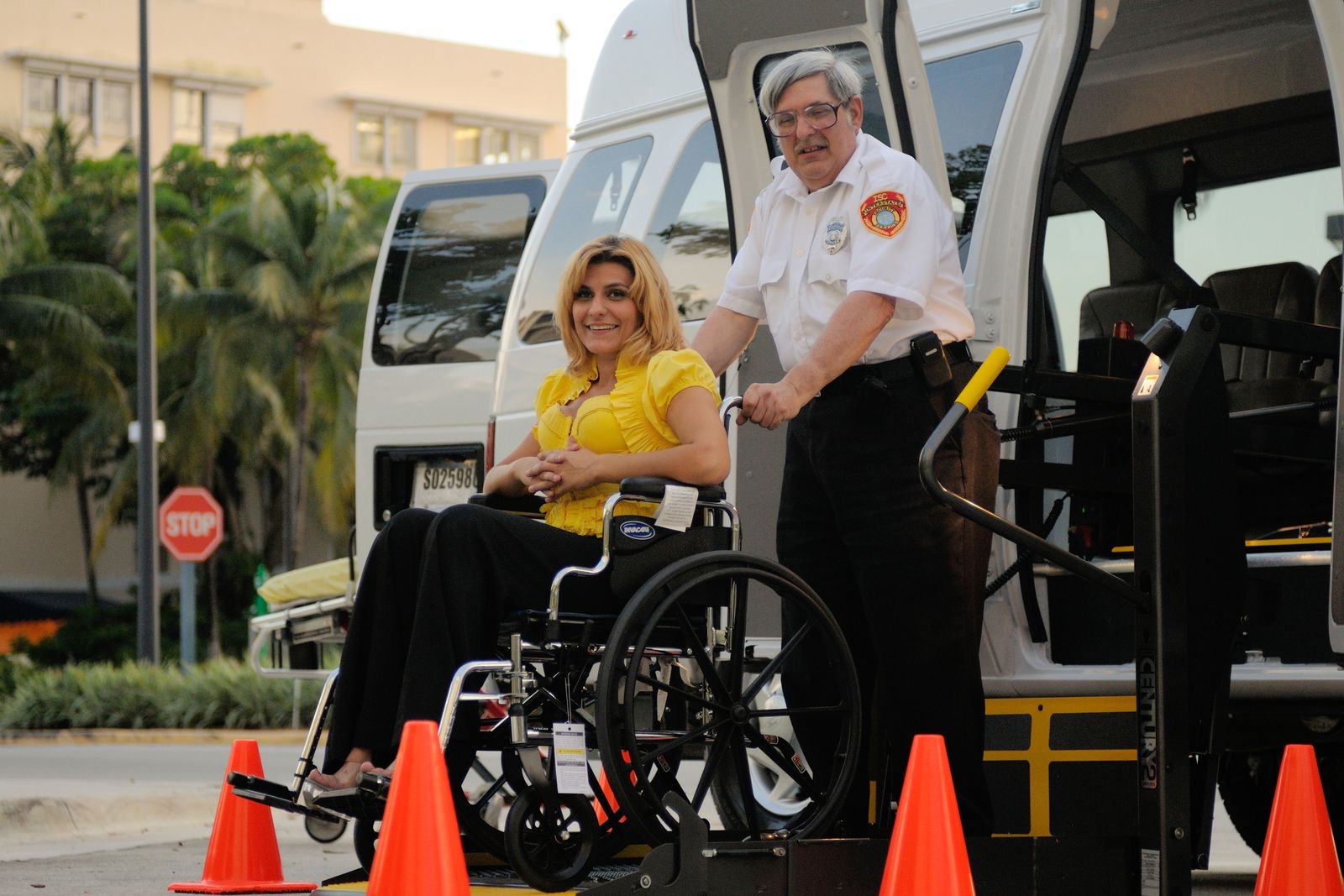 An accessible transport service helping a wheelchair user