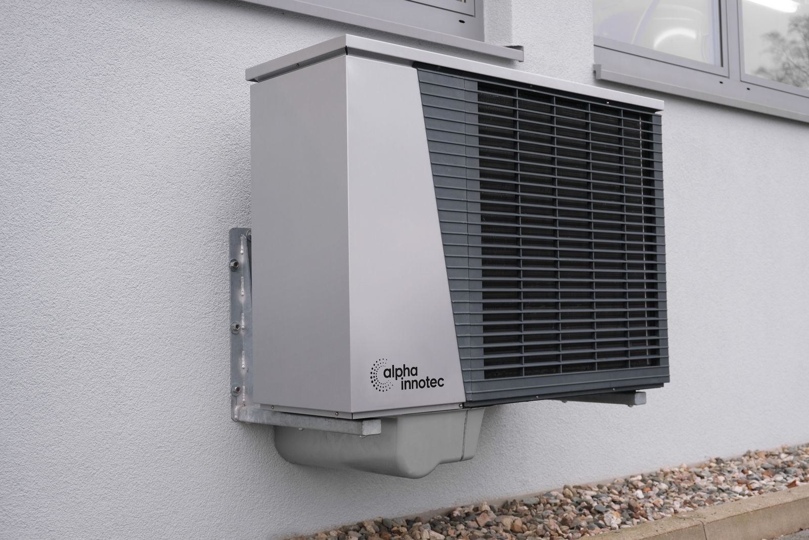 An air conditioner on an apartment wall