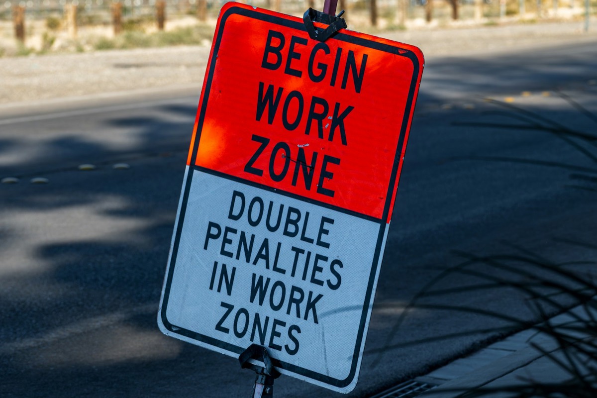 Begin work zone, double penalties in work zones sign
