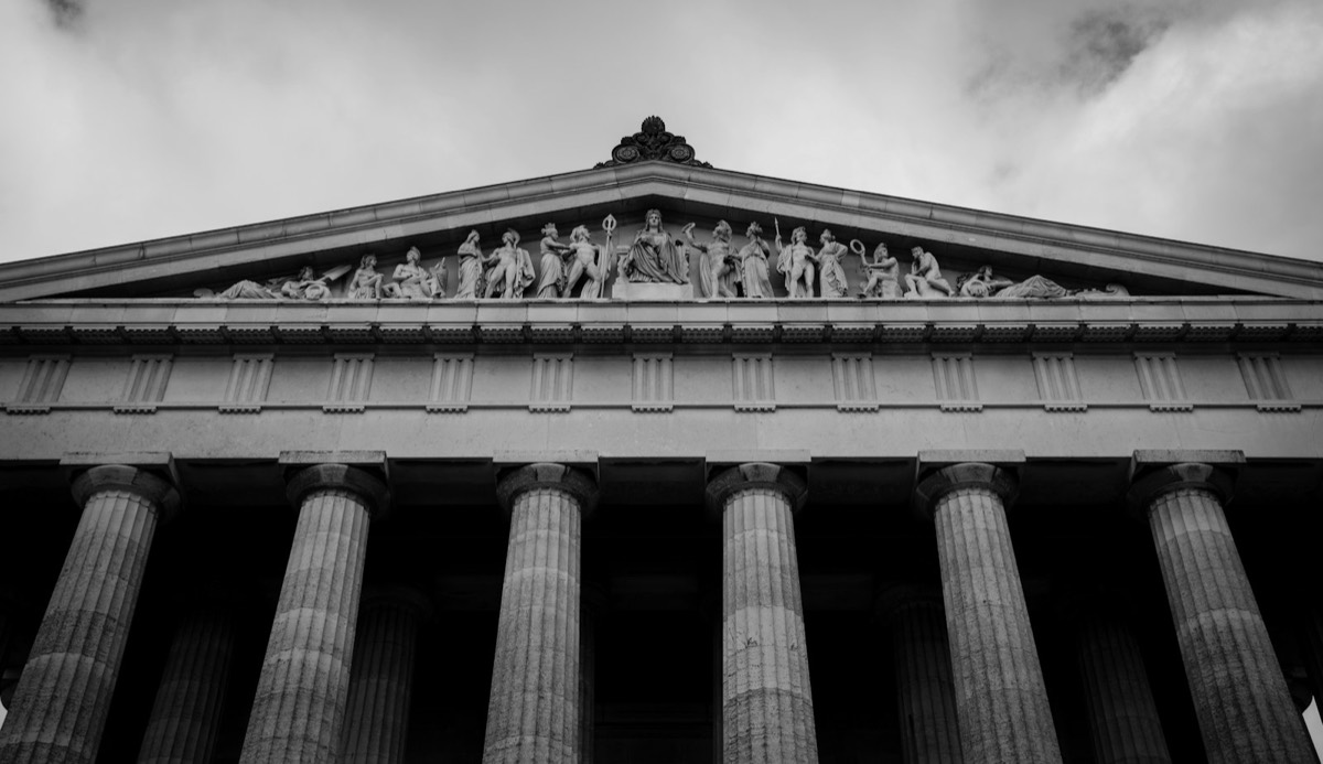 Grayscale photo of concrete building