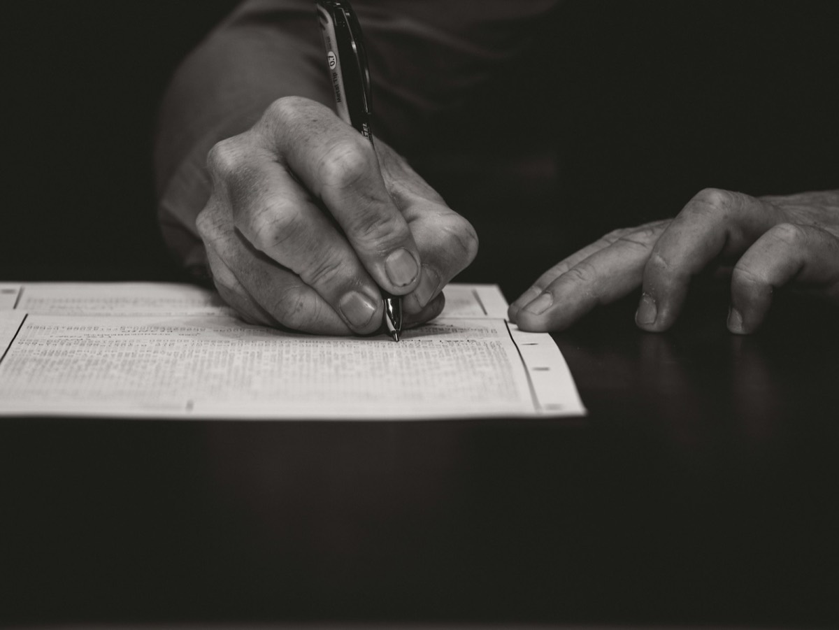 Hand writing with a fountain pen on paper