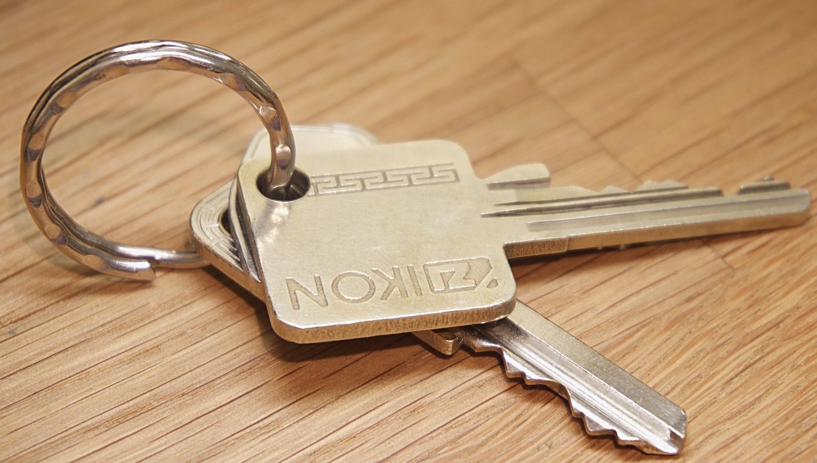 House keys on a wooden table