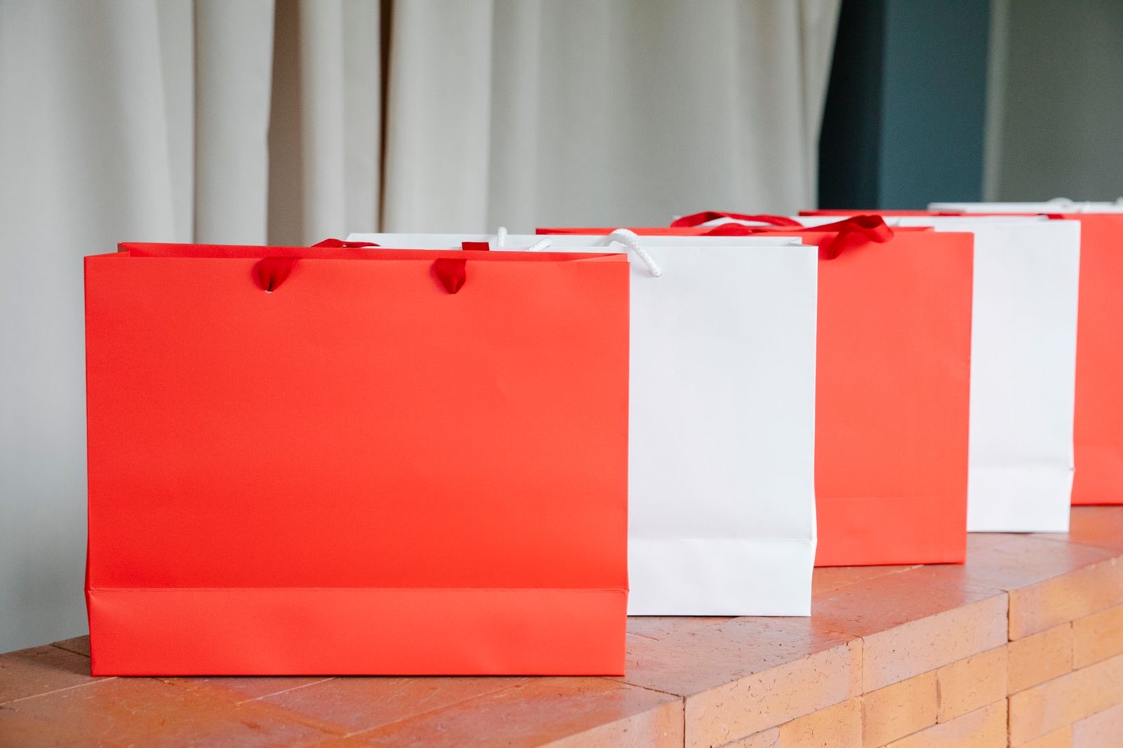 Paper shopping bags on a shelf