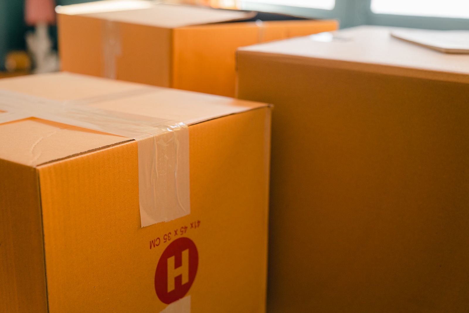 Sealed moving boxes by a window